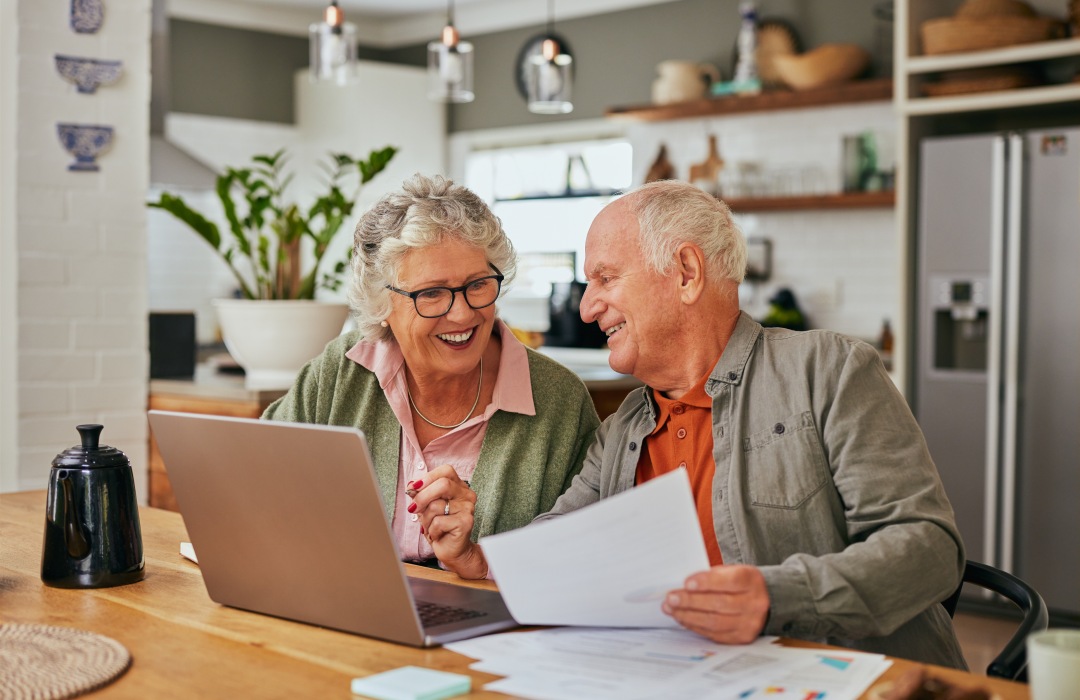 How to Pay for Assisted Living Older couple reviewing finances