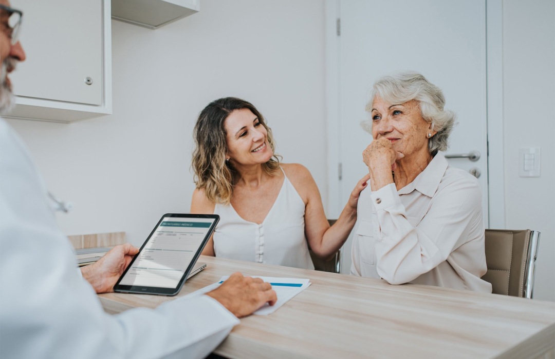 Senior woman at the doctor Senior mother and her daughter at doctor's office