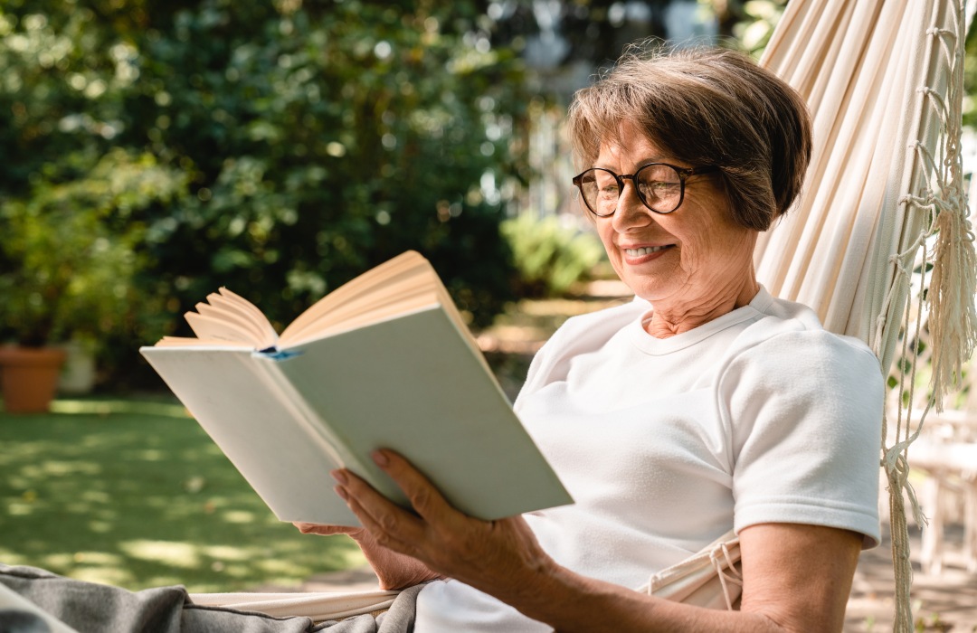 Senior woman reading book Senior woman reading book
