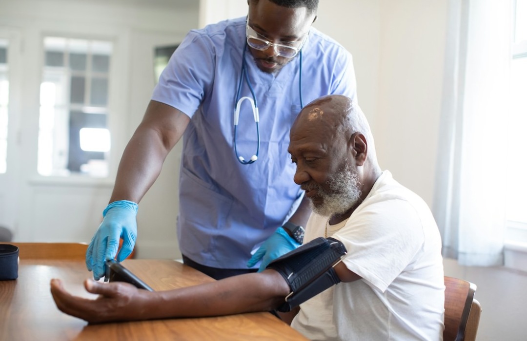 Blood Pressure Nurse taking a mans bloodpressure