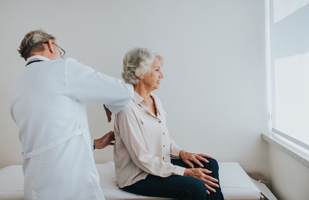 Prevent Seniors from Falling Older woman getting a checkup at the doctor