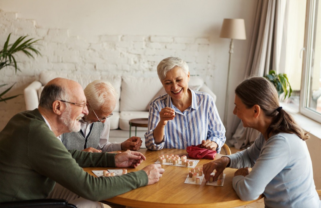 Socially Active Group of friends playing a board game