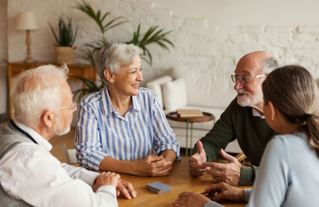 Group of people sitting around talking