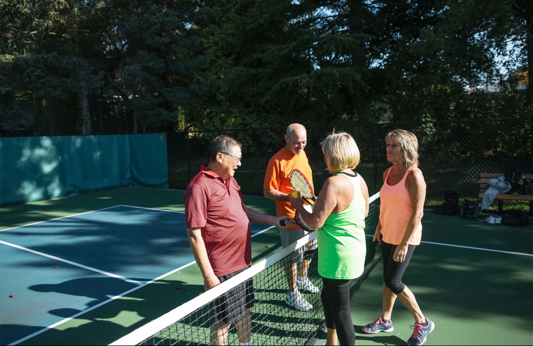 Pickleball Group of people playing pickleball